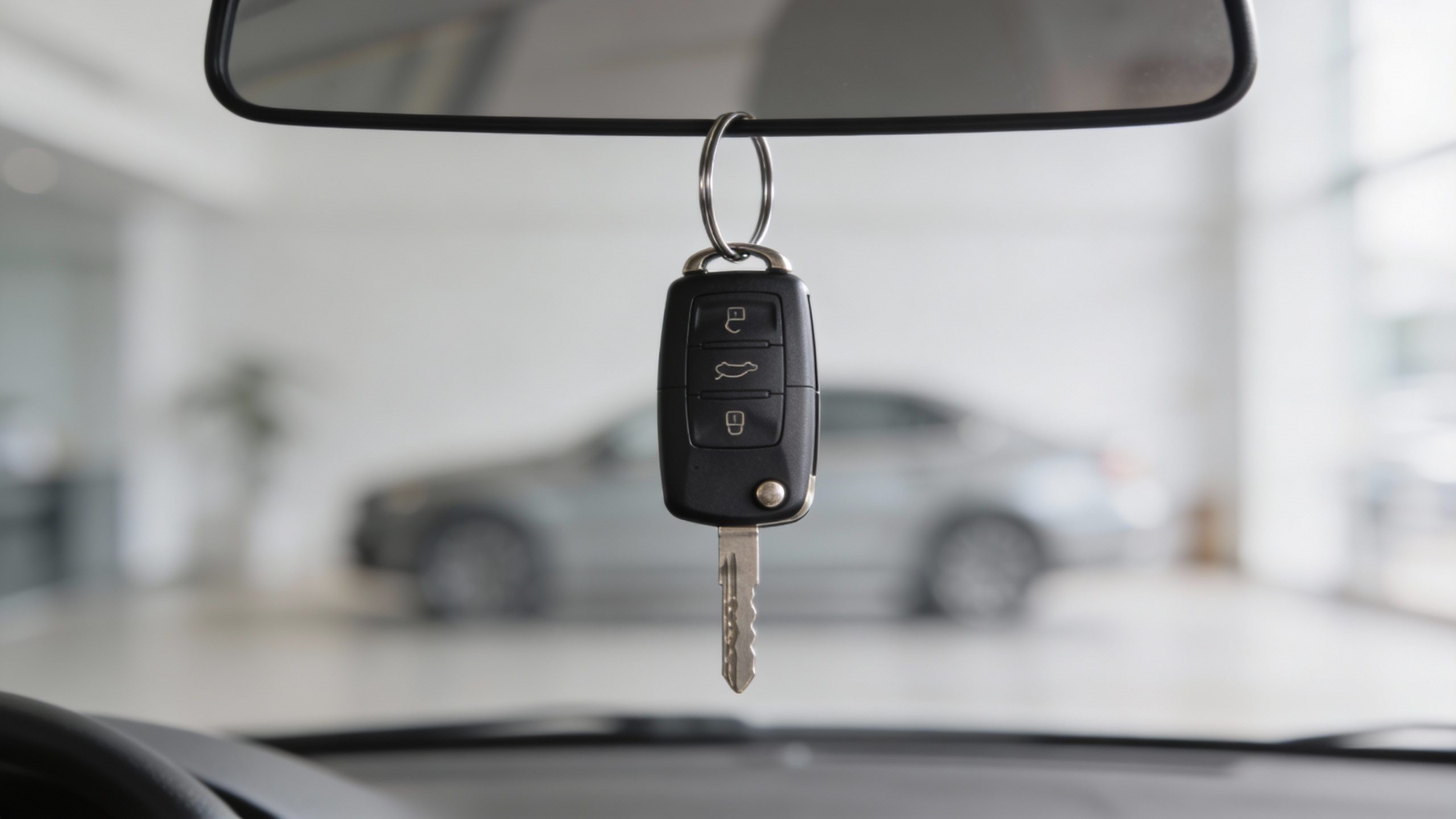 **Modern minimalist keyring with a single car key**  *Each prompt focuses on one key subject from the article (housing, food, transportation) while keeping the composition clean and professional.*