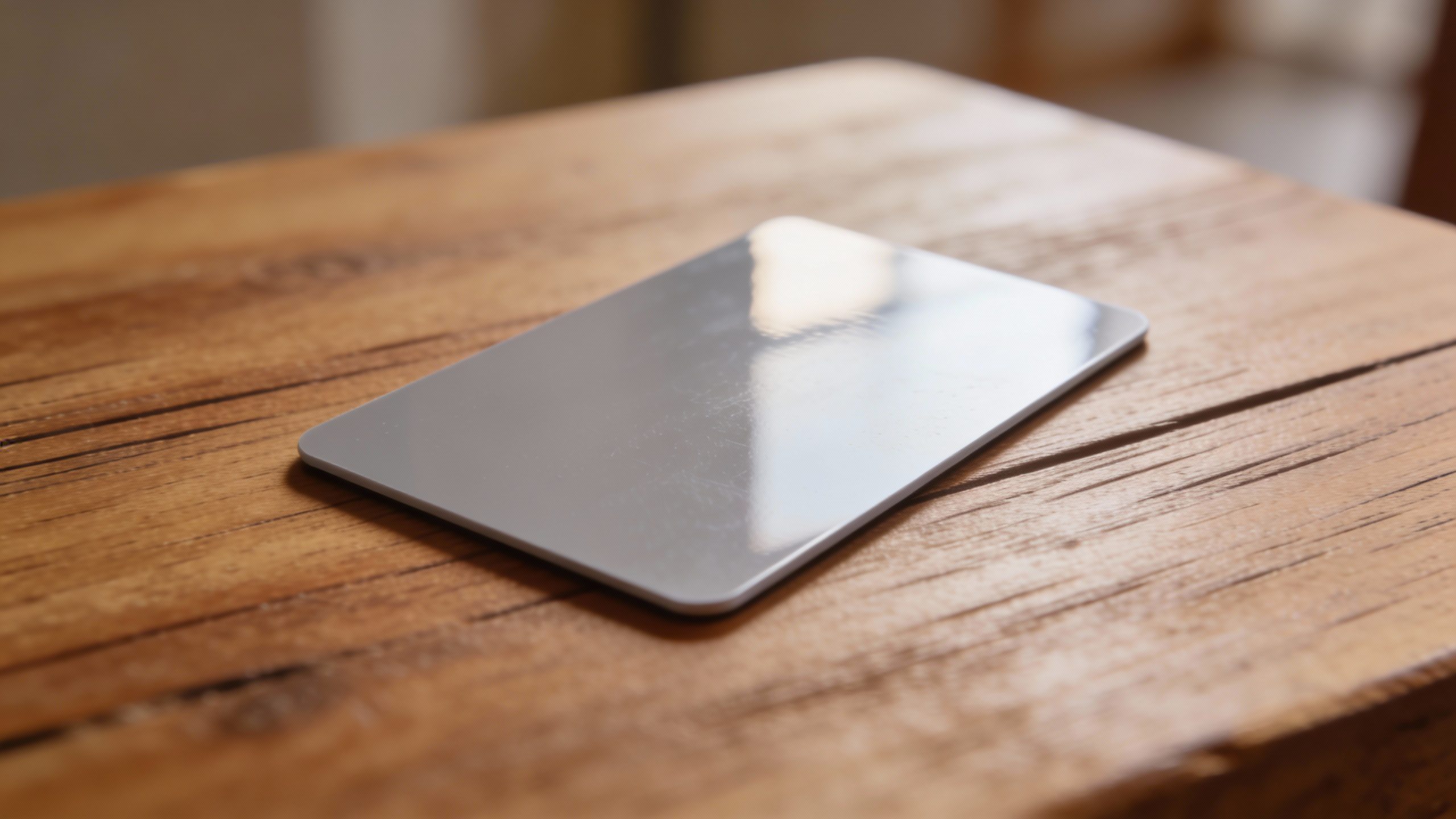 **Single unused gym membership card on a wooden table**