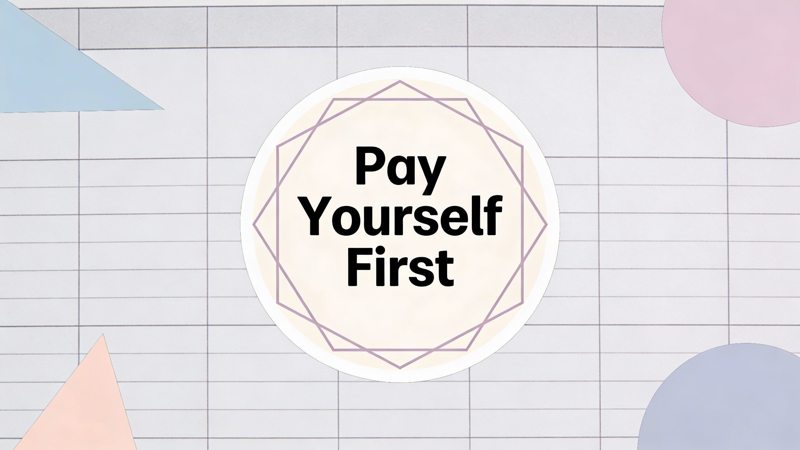 sticker reading “Pay Yourself First” on planner dashboard page