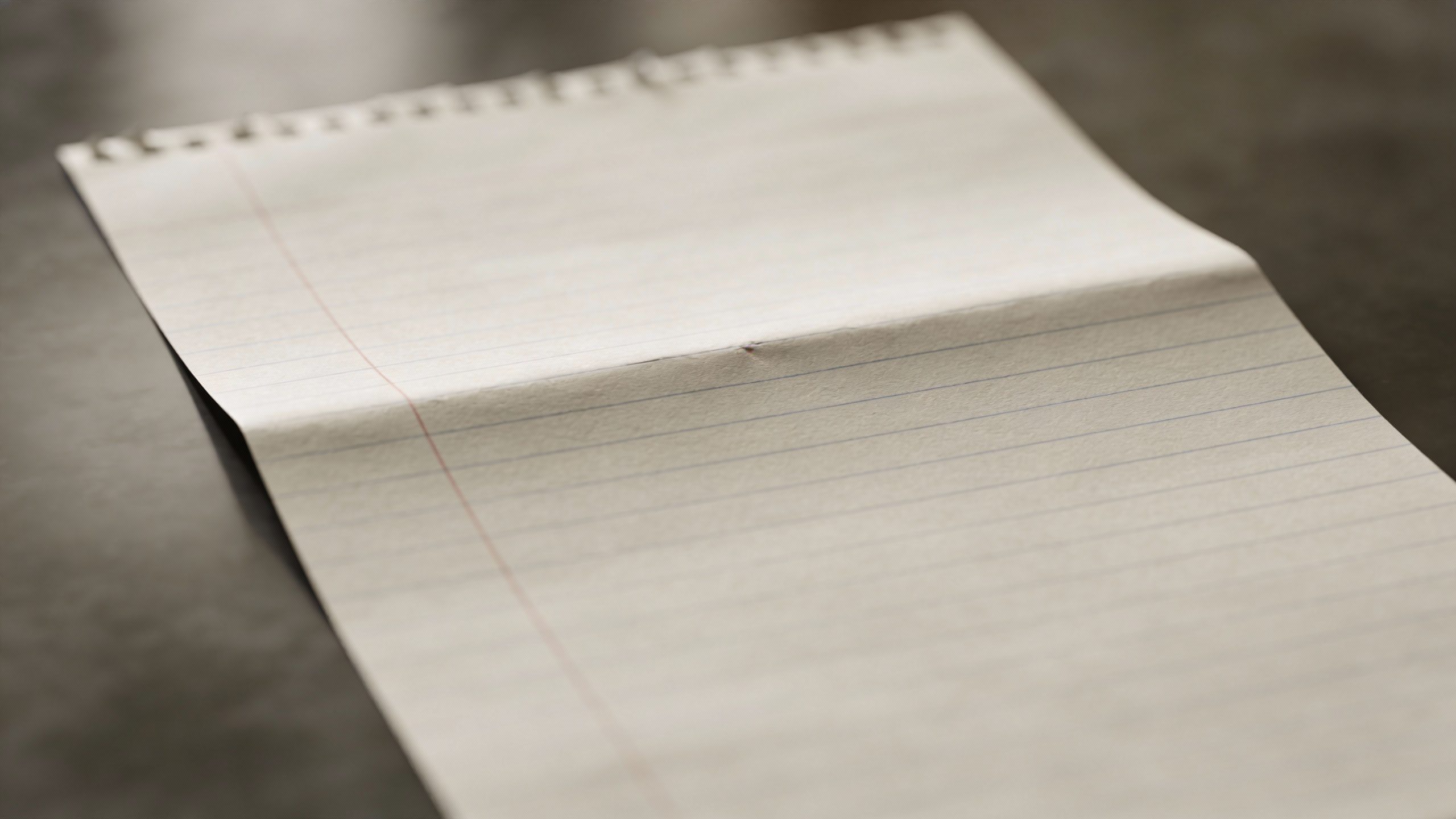closeup of a single grocery shopping list on plain paper
