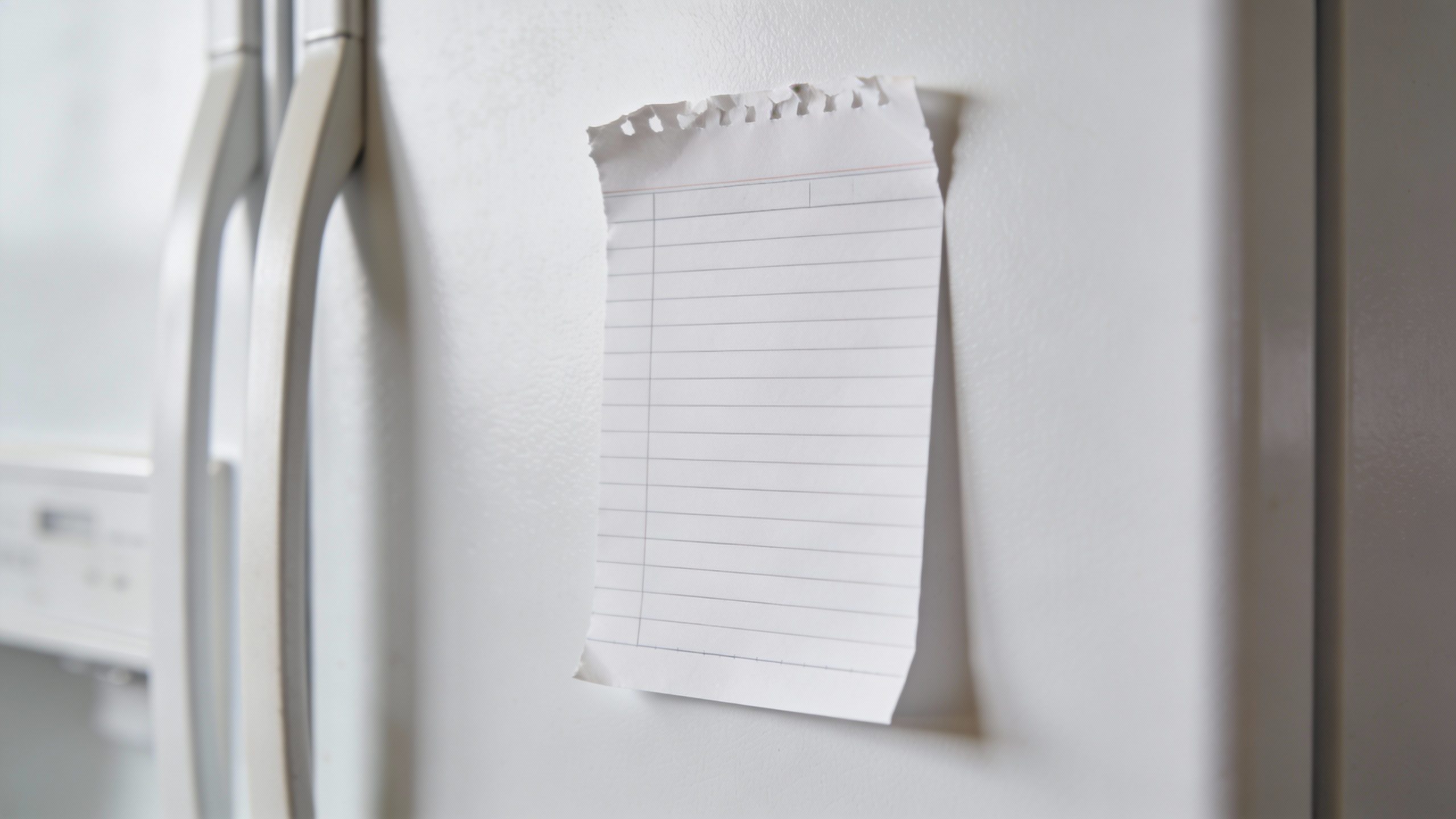 Closeup of a single fridge inventory note on a whiteboard