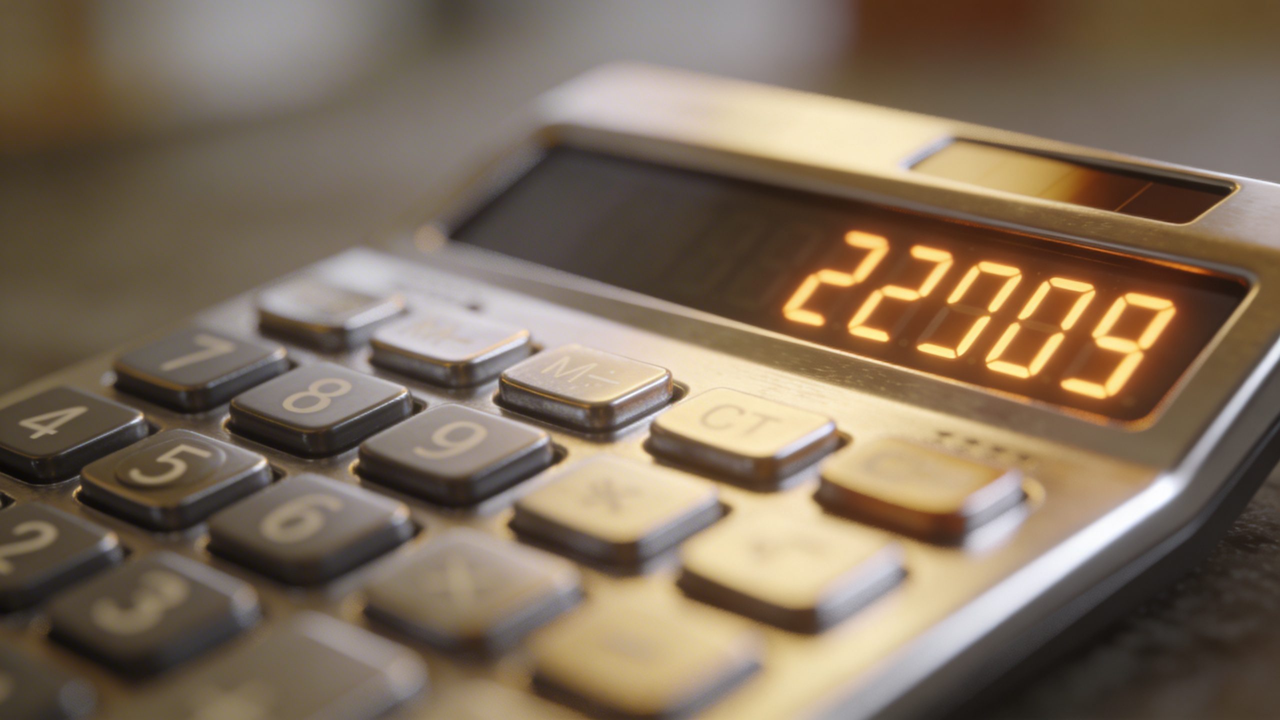 closeup of a single calculator displaying numbers, shallow depth of field