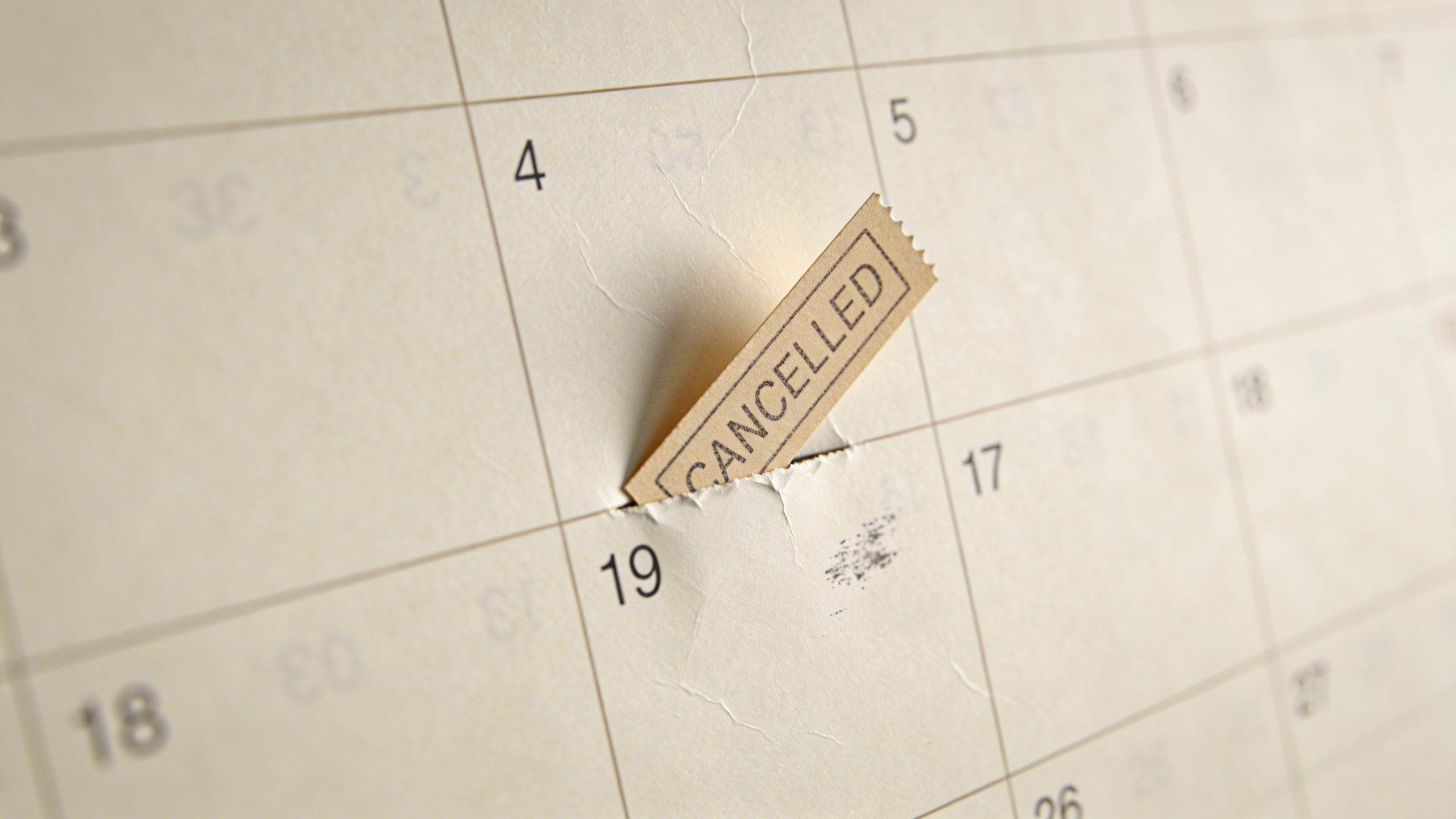 Closeup of a calendar page marking a canceled subscription receipt