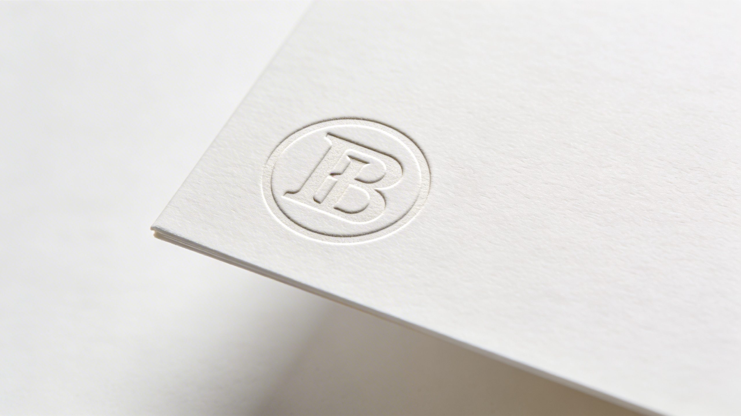 closeup of a designer logo on a white notepad