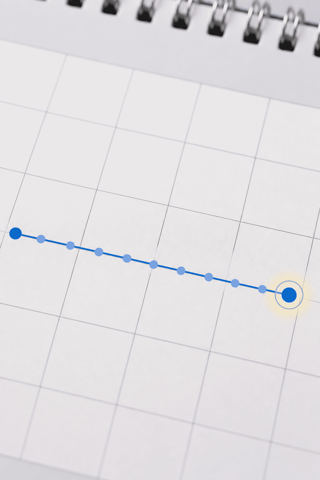 Closeup of a calendar page showing a labeled “18 months” timeline and a highlighted target date